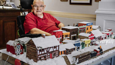 Photo of Nursing Home Resident Creates Whimsical Winter Villages Made of Scrap Materials
