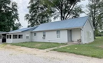 Photo of This very spacious home is located on 8.42 acres that is mostly fenced in Jasper School district. $110,000