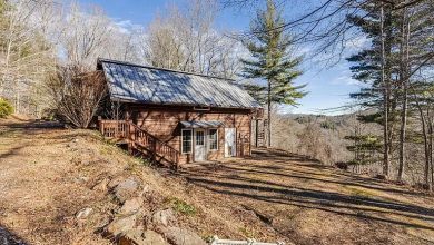 Photo of Indulge in the rustic allure of this barn-style cabin, situated on 15 unrestricted acres of enchanting wooded landscape, only 10-minutes from Burnsville. $395,000