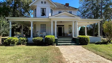 Photo of This Charming Victorian Home is located in the Historic District of Americus and welcomes you with a lovely wrap around front porch for enjoying. $282,000